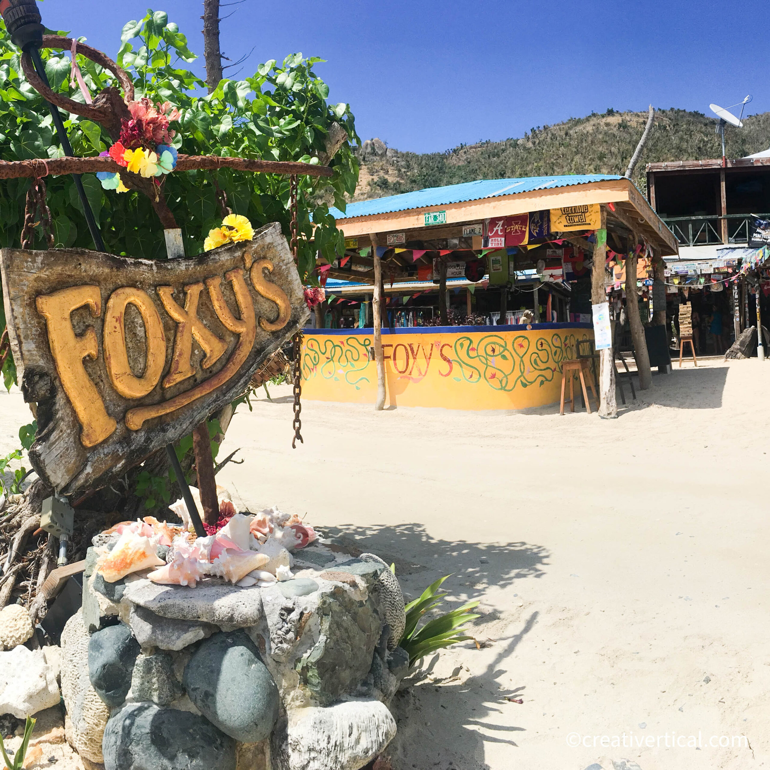 Entrance to Faxy-s Bar, Great Harbout, Jost Van Dyke BVI, on a sunny day at the beach during a BVI Powerboat Tour.