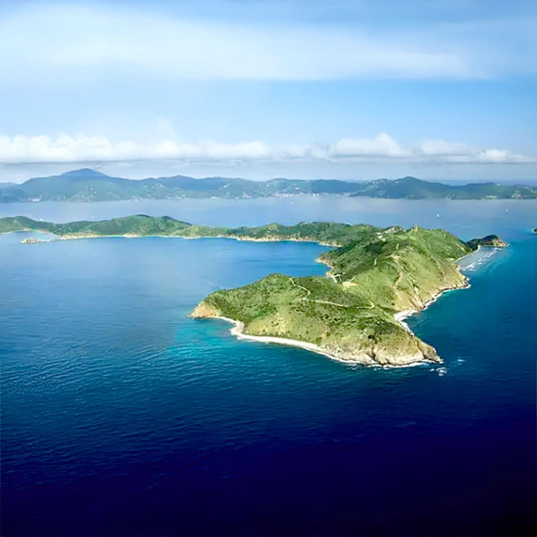 Peter Island, BVI from above with Tortola, BVI in the background.
