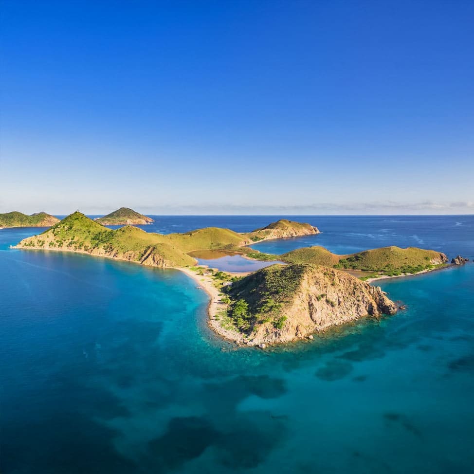 Beautiful, lush, Salt Island BVI from above with t perfect blue sky for miles.
