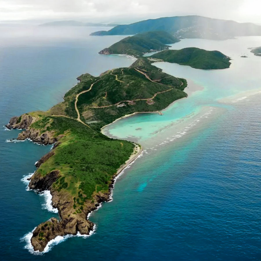 Aerial view of the east end of Virgin Gorda BVI. Rocky Shorelines, dramatic cliffs, with waves crashing.
