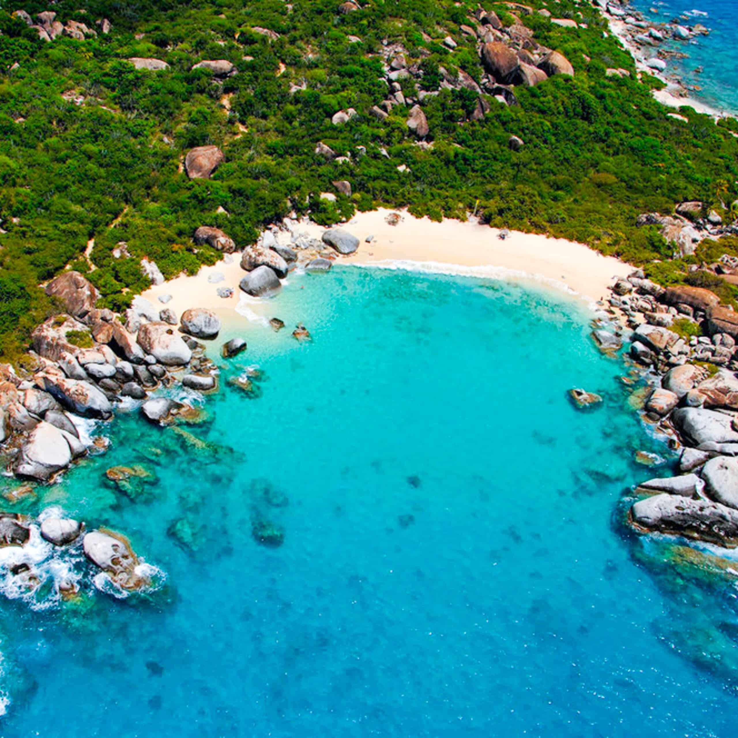 Aerial shot of one of the worlds most iconic beaches. a minutes walk from the Baths, Devils Bay, Virgin Gorda, BVI is a sight to behold during a Celtic Boats private powerboat tour to Virgin Gorda..