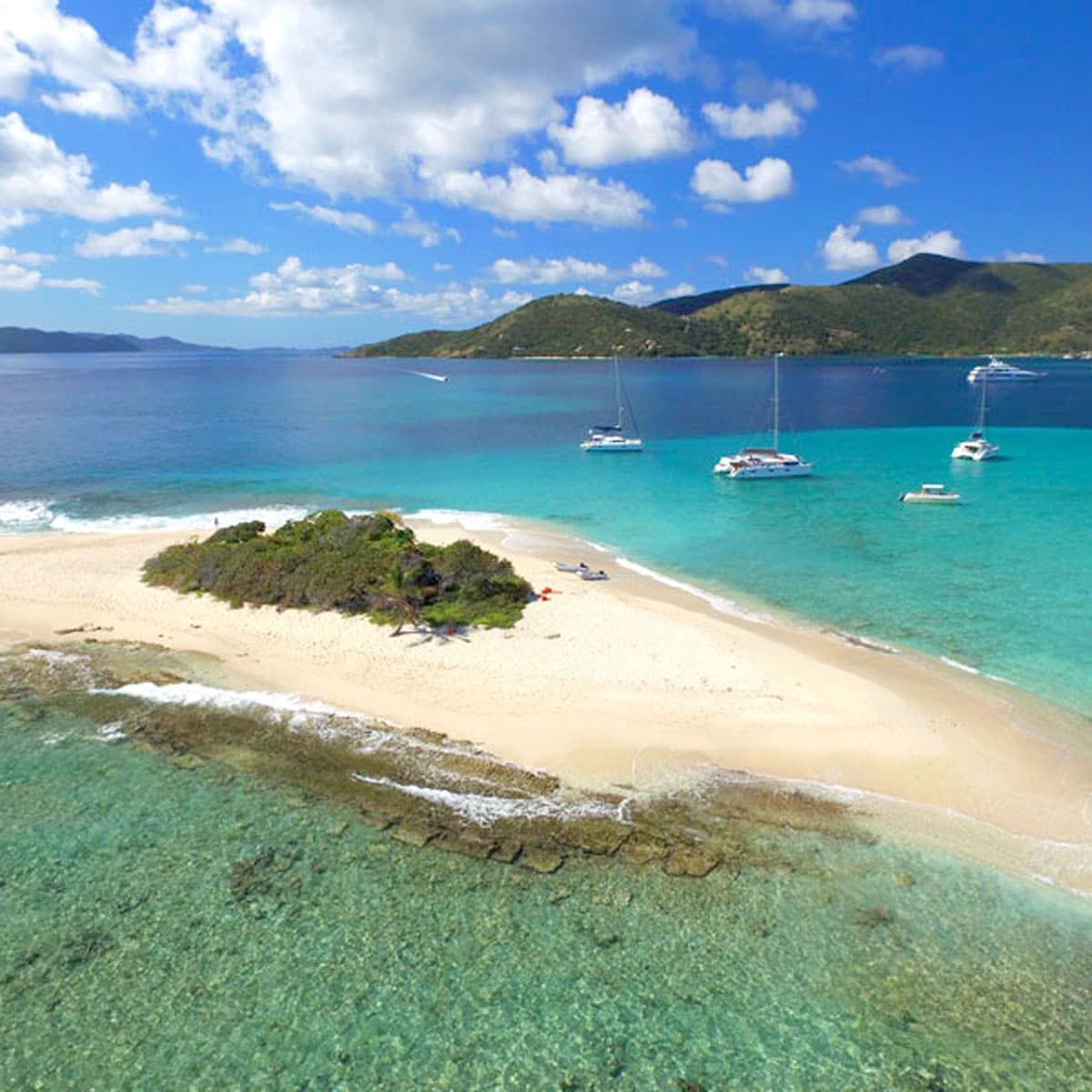 Celtic Powerboats private boat tours most popular stop. Sandy Spit, BVI is one of the most popular anchorages and snorkel spots in the entire BVI