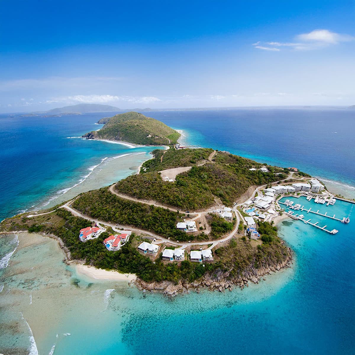 Scrub Island from above, with a calm break water protected marina to the west.