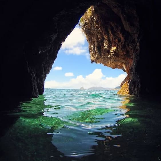 Looking out from the Caves, Norman Island, BVI during a private powerboat tour in the BVI.